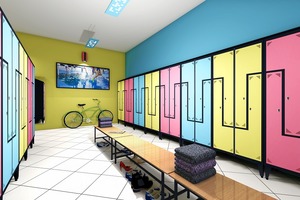 Kolorowe szafy typu L w szatni w obiekcie sportowym